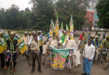 झारखंड में बैलगाड़ी पर बैठ कर सड़कों पर उतरे बंद समर्थक
